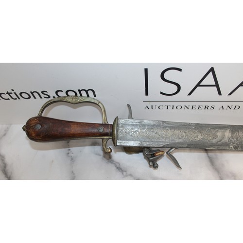 149 - Flint Lock Pistol Sword/Dagger Replica 1900's
Length 63cm
COLLECTION ONLY 
ID WILL BE NEEDED UPON CO... 