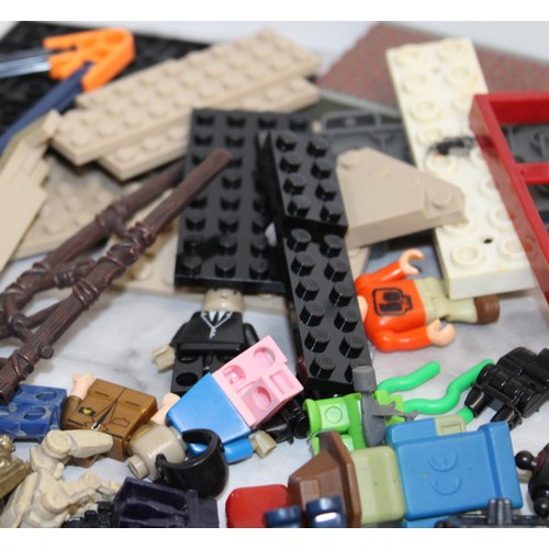 706 - A Quantity Of Collectable Play Worn Lego Pieces Etc