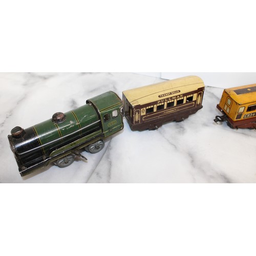 707 - A Selection Of Collectable OO Gauge Tin Railway Engine And Carriages