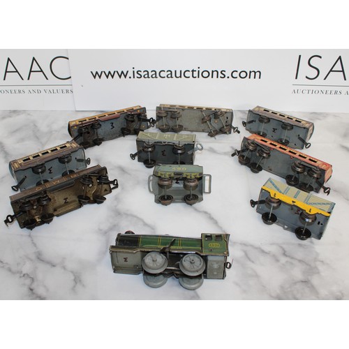 707 - A Selection Of Collectable OO Gauge Tin Railway Engine And Carriages