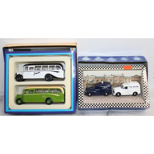 715 - 2 x Boxed Corgi Island Transport And Morris Minors Vans Die-Cast Vehicle
All Look To Be In Good Cond... 