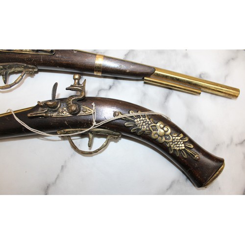 75 - 2 x Decorative Pistols Made In England...