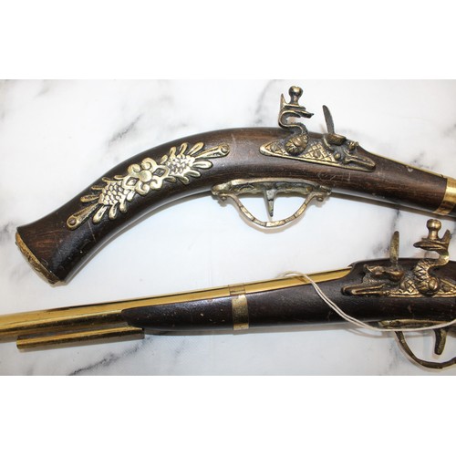 75 - 2 x Decorative Pistols Made In England...