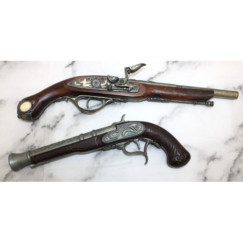 77 - 2 x Reproduction Flintlock Pistols...