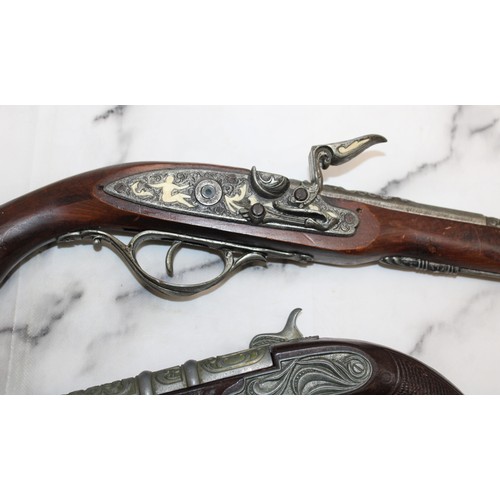 77 - 2 x Reproduction Flintlock Pistols...