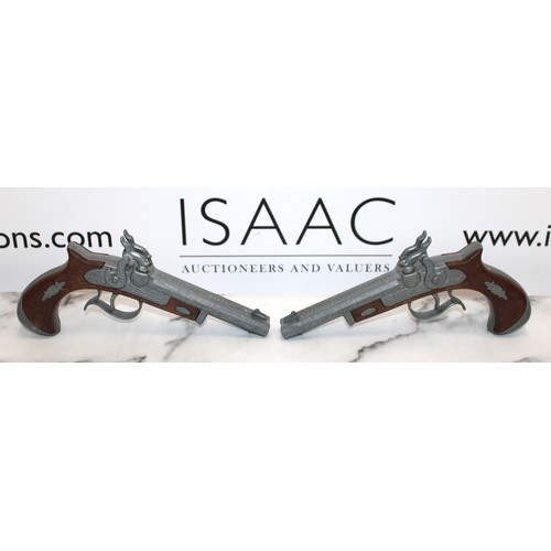 78 - 2 x Reproduction Deringer Double Barrel Cap Guns...