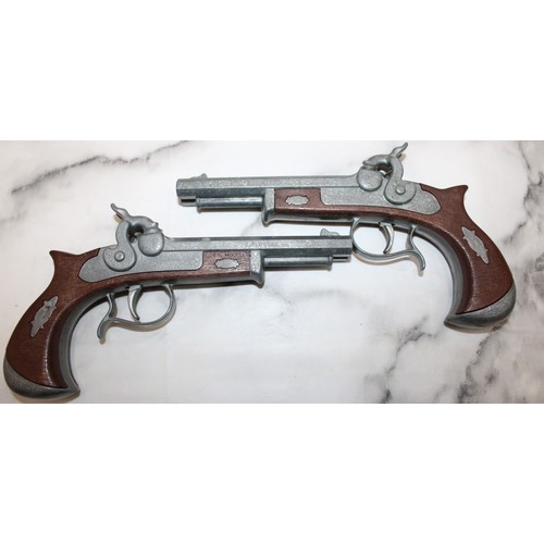 78 - 2 x Reproduction Deringer Double Barrel Cap Guns...