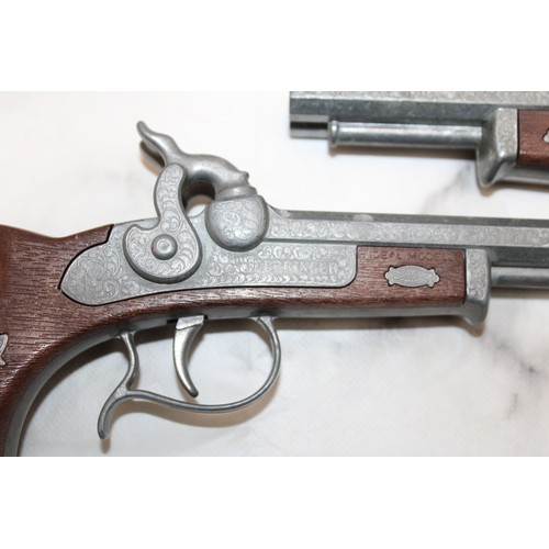 78 - 2 x Reproduction Deringer Double Barrel Cap Guns...