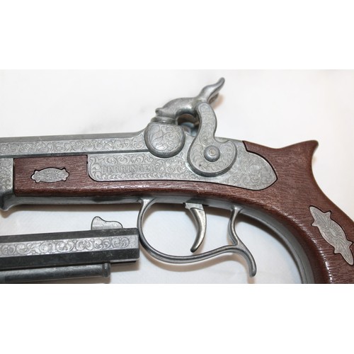 78 - 2 x Reproduction Deringer Double Barrel Cap Guns...