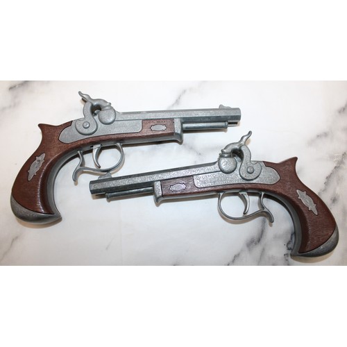 78 - 2 x Reproduction Deringer Double Barrel Cap Guns...