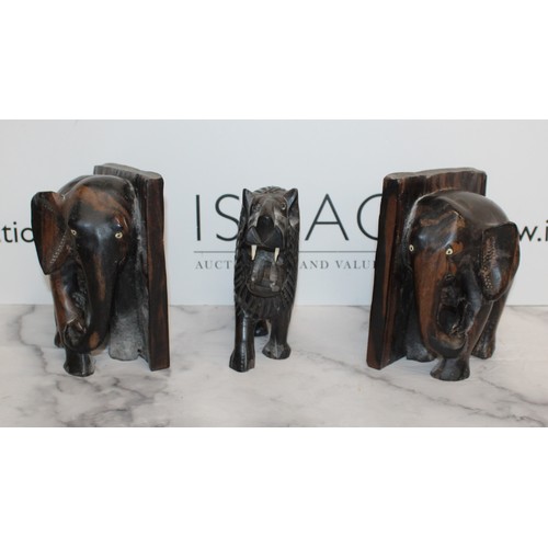 14 - Wooden Animal Carvings, Elephant Book Ends And Lion
Height Of Bookends 18cm