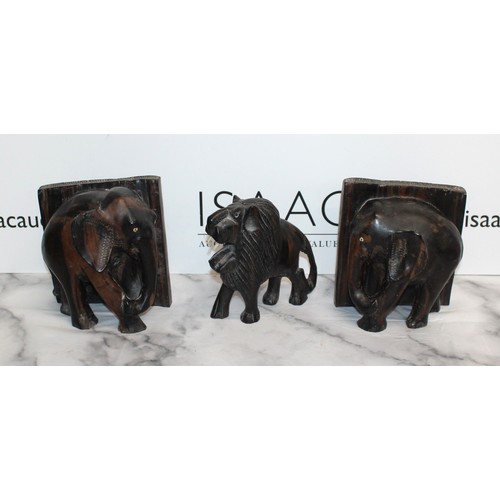 14 - Wooden Animal Carvings, Elephant Book Ends And Lion
Height Of Bookends 18cm