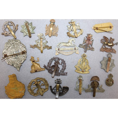 318 - Selection Of 20 Military Cap Badges 
Various Conditions