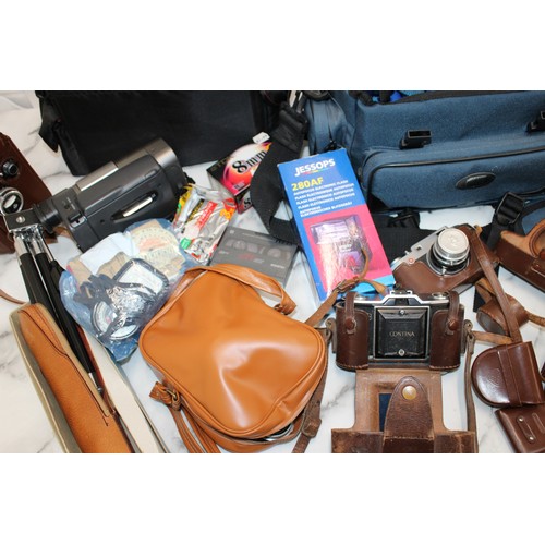 245 - A Quantity Of Cameras/MINOLTA/OLYMPUS And Equipment Binoculars Etc All Untested
In Large Duffel Bag