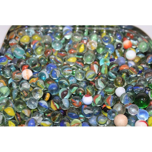 97 - A Large Quantity Of Marbles In Tins