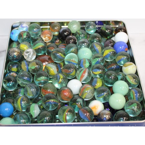 97 - A Large Quantity Of Marbles In Tins