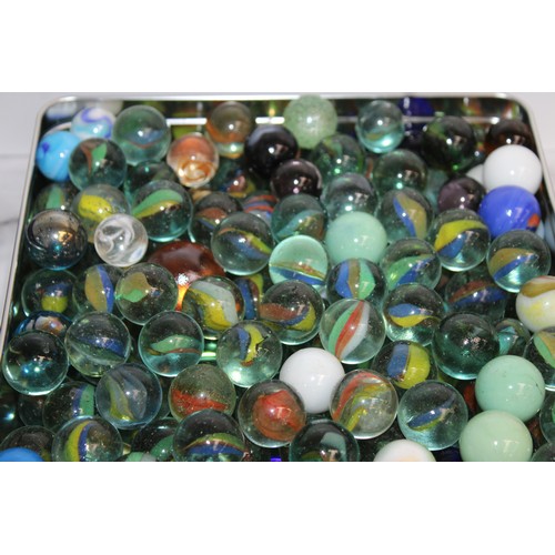 97 - A Large Quantity Of Marbles In Tins