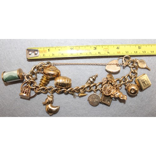 619 - Stamped 375 Gold Charm Bracelet With 375 /14K Charms Total Weight 60.74g