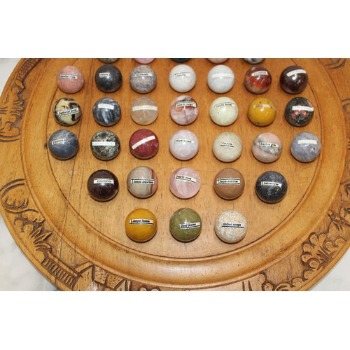 120 - Solitaire Game 47.5cm x49cm Including 37 Individual Semi Precious Stones On Wooden Board
Each stone ... 