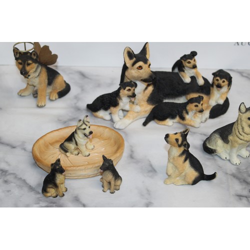 128 - A Collection Of German Shepard Figures Various Conditions
Length Of Largest 21cm 
COLLECTION ONLY