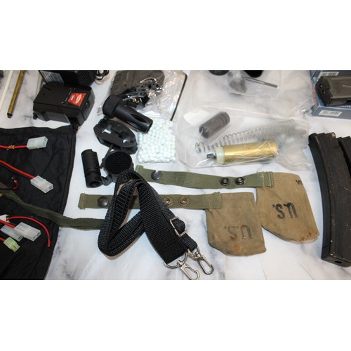 282 - A Quantity Of Air Soft Accessories Including, Silencers, Magazines, BB Bullets, Brackets, Stocks And... 