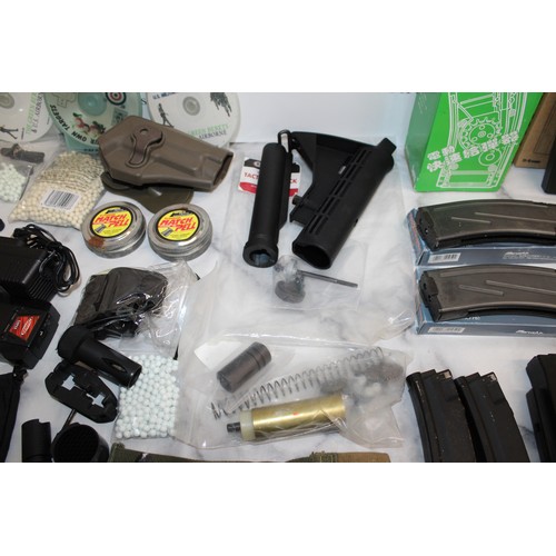 282 - A Quantity Of Air Soft Accessories Including, Silencers, Magazines, BB Bullets, Brackets, Stocks And... 