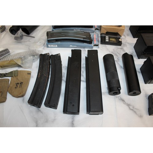 282 - A Quantity Of Air Soft Accessories Including, Silencers, Magazines, BB Bullets, Brackets, Stocks And... 