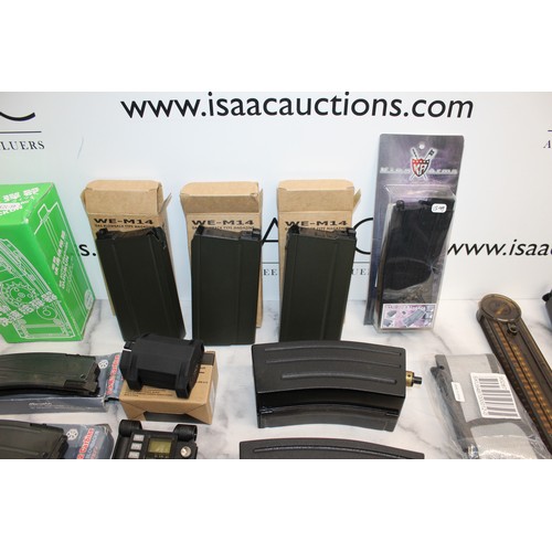 282 - A Quantity Of Air Soft Accessories Including, Silencers, Magazines, BB Bullets, Brackets, Stocks And... 