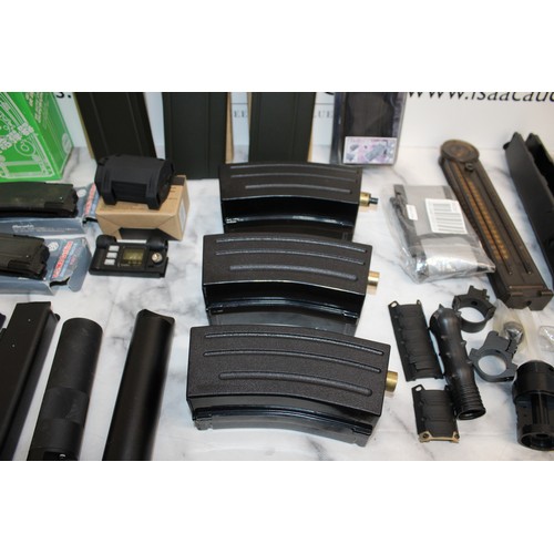 282 - A Quantity Of Air Soft Accessories Including, Silencers, Magazines, BB Bullets, Brackets, Stocks And... 