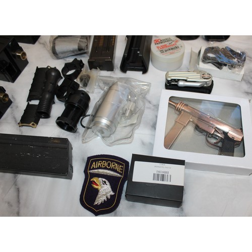 282 - A Quantity Of Air Soft Accessories Including, Silencers, Magazines, BB Bullets, Brackets, Stocks And... 