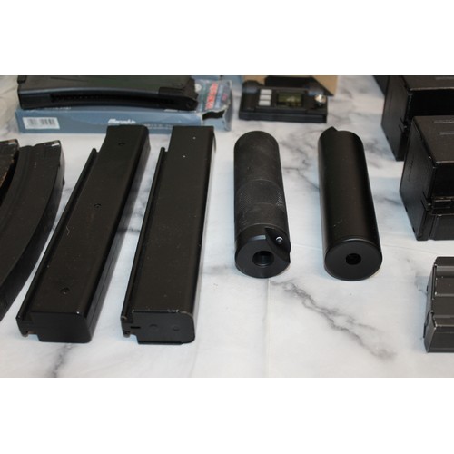 282 - A Quantity Of Air Soft Accessories Including, Silencers, Magazines, BB Bullets, Brackets, Stocks And... 