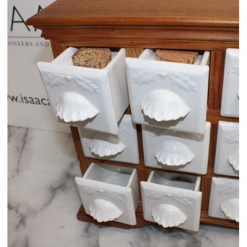 142 - A Wooden Spice Rack With Ceramic Draws H:36cm L:44cm
COLLECTION ONLY