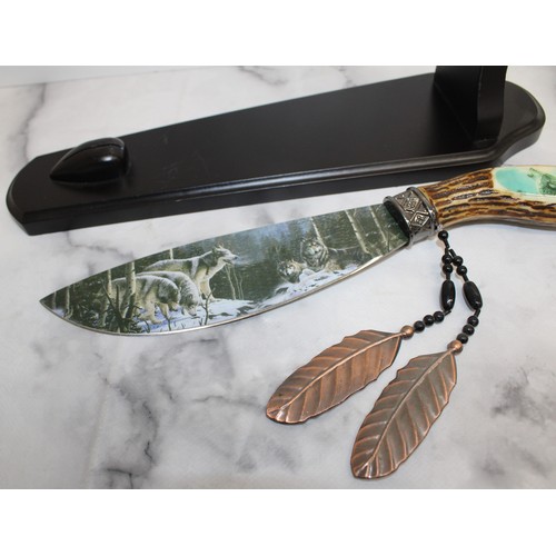 150 - A Collectable Decorative Hunting Knife With Painted Wolves Stand Length:33cm
PROOF OF ID (OVER 18) 
... 