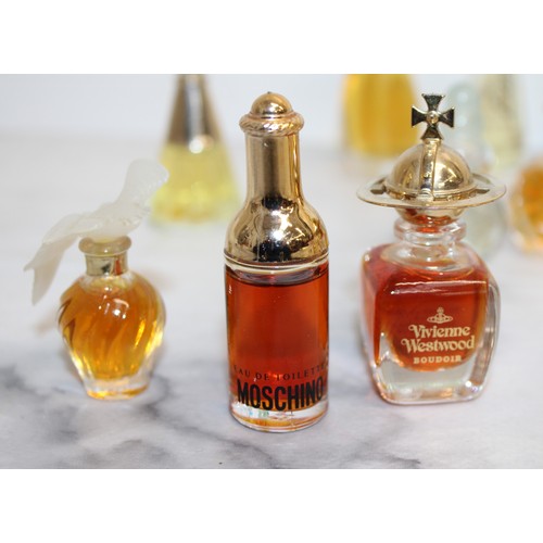 151 - A Selection Of Collectable Miniature Perfume Bottles Majority Contain Perfume Tallest:9.5cm