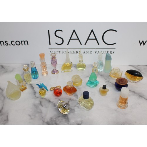 153 - A Selection Of Collectable Miniature Perfume Bottles Etc The Majority Contain Perfume Tallest:8.5cm