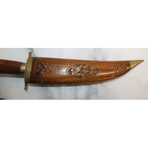 165 - Carved Decorative Wooden Indian Dagger And Smaller Dagger In Leather Sheath
COLLECTION ONLY
OVER 18'... 