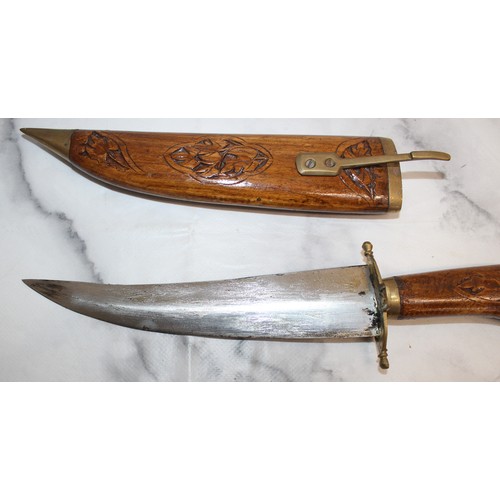 165 - Carved Decorative Wooden Indian Dagger And Smaller Dagger In Leather Sheath
COLLECTION ONLY
OVER 18'... 