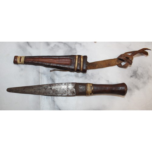 165 - Carved Decorative Wooden Indian Dagger And Smaller Dagger In Leather Sheath
COLLECTION ONLY
OVER 18'... 