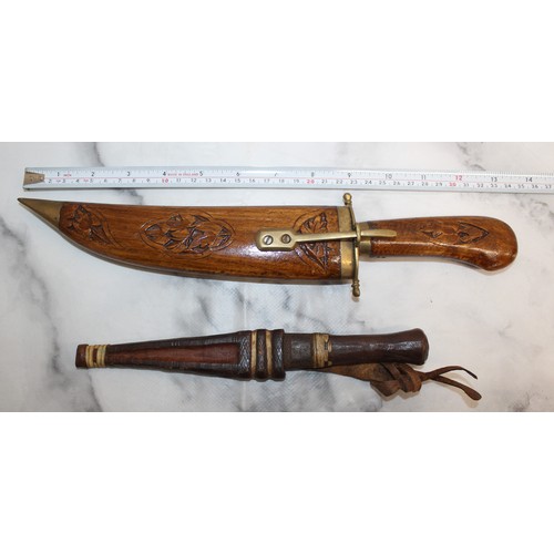 165 - Carved Decorative Wooden Indian Dagger And Smaller Dagger In Leather Sheath
COLLECTION ONLY
OVER 18'... 