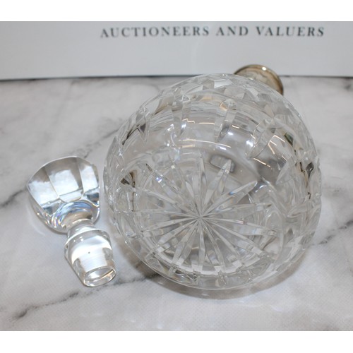 607 - A Collectable Glass Decanter With A Silver Hall Marked Top H:28cm
COLLECTION ONLY