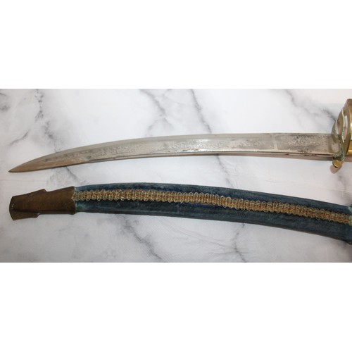 181 - A Cavalry Sword & A Indian Carved Wood Handle & Sheath Knife
ID To Be Seen On Collection Over 18 
CO... 