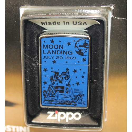 19 - A Sealed Collectable Zippo Magazine And Lighter Commemorating The 1969 Moon Landing