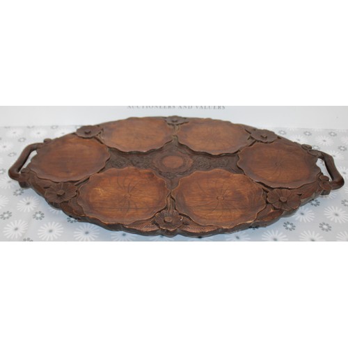 281 - Vintage Hand Carved Wooden Serving Tray
Dimensions 62cm x 34.5cm