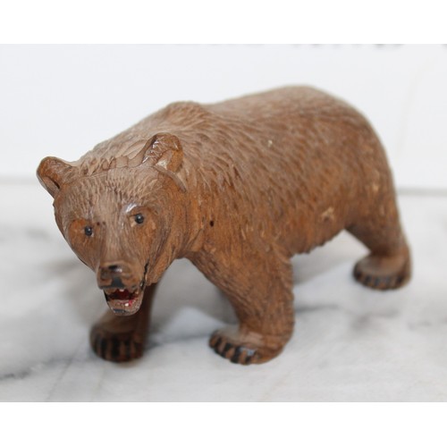 291 - Carved Black Forest Bear
Height 7cm