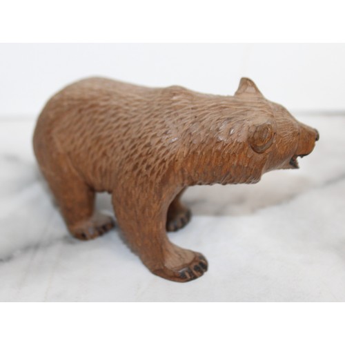 291 - Carved Black Forest Bear
Height 7cm