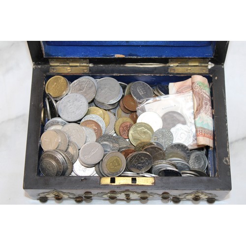 A Decorative Wooden Box Containing Worldwide Coins And Note