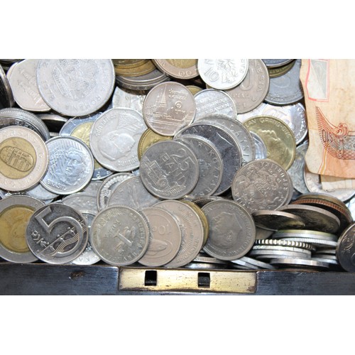 A Decorative Wooden Box Containing Worldwide Coins And Note