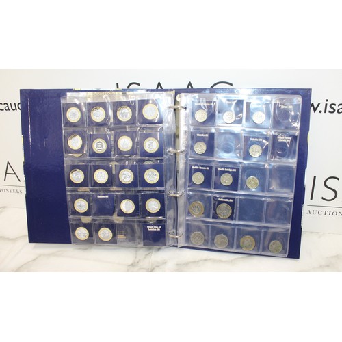 A Collectable Change Checker Album Containing 17 One Pound/19 Two Pound ...