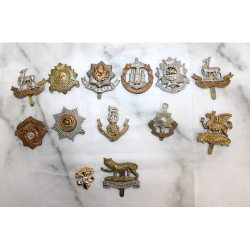 226 - A Selection Of Military Cap Badges - As Found