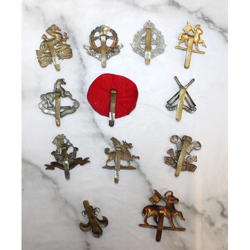 228 - A Selection Of Collectable Military Cap Badges - As Found